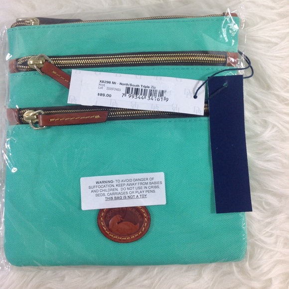Dooney & Bourke Handbags - Dooney & Bourke North/South triple zip Crossbody